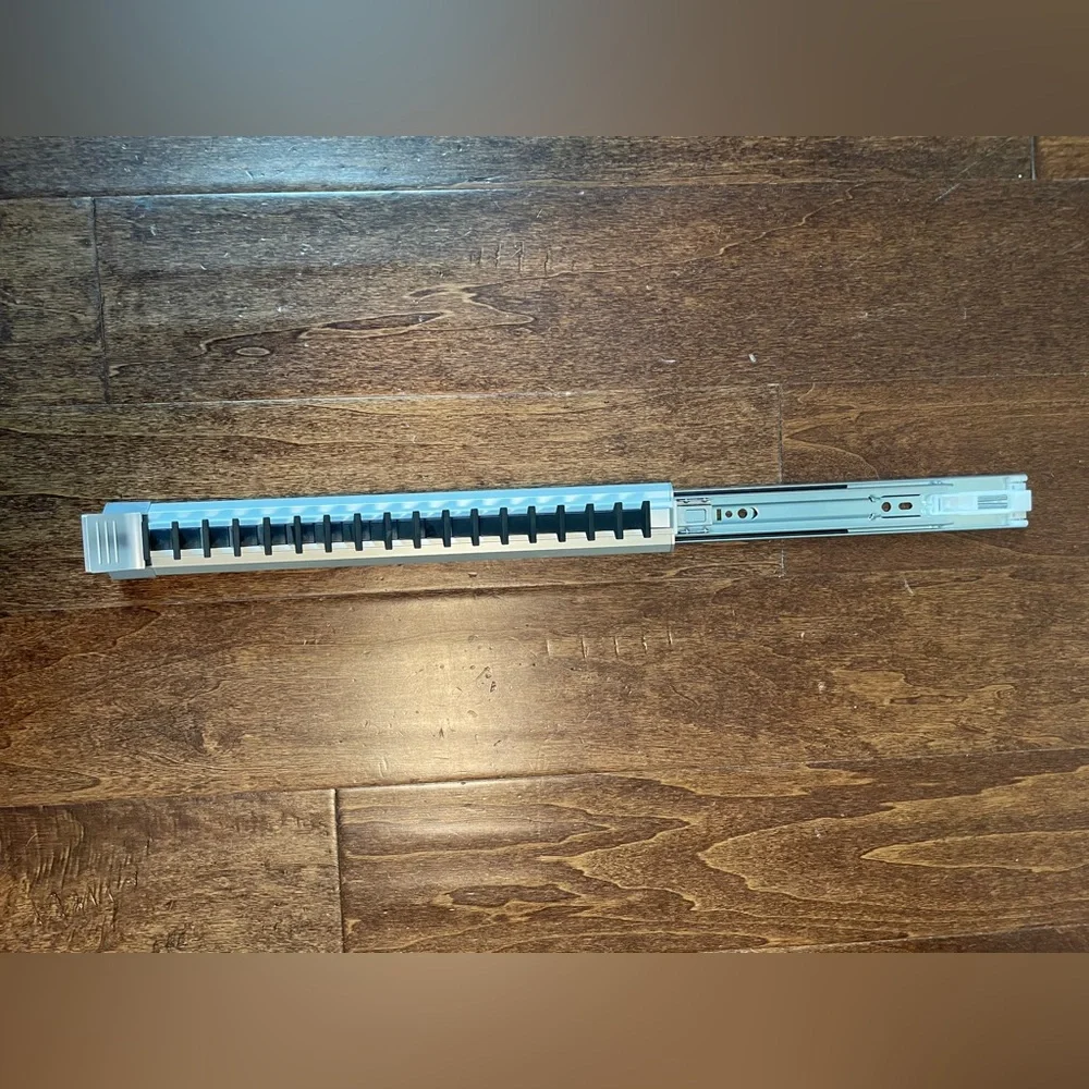 Mountable slide-out tie holder